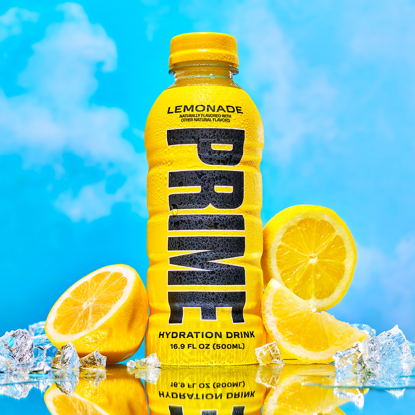 A display of Prime Hydration in flavor lemonade next to slices of lemons.
