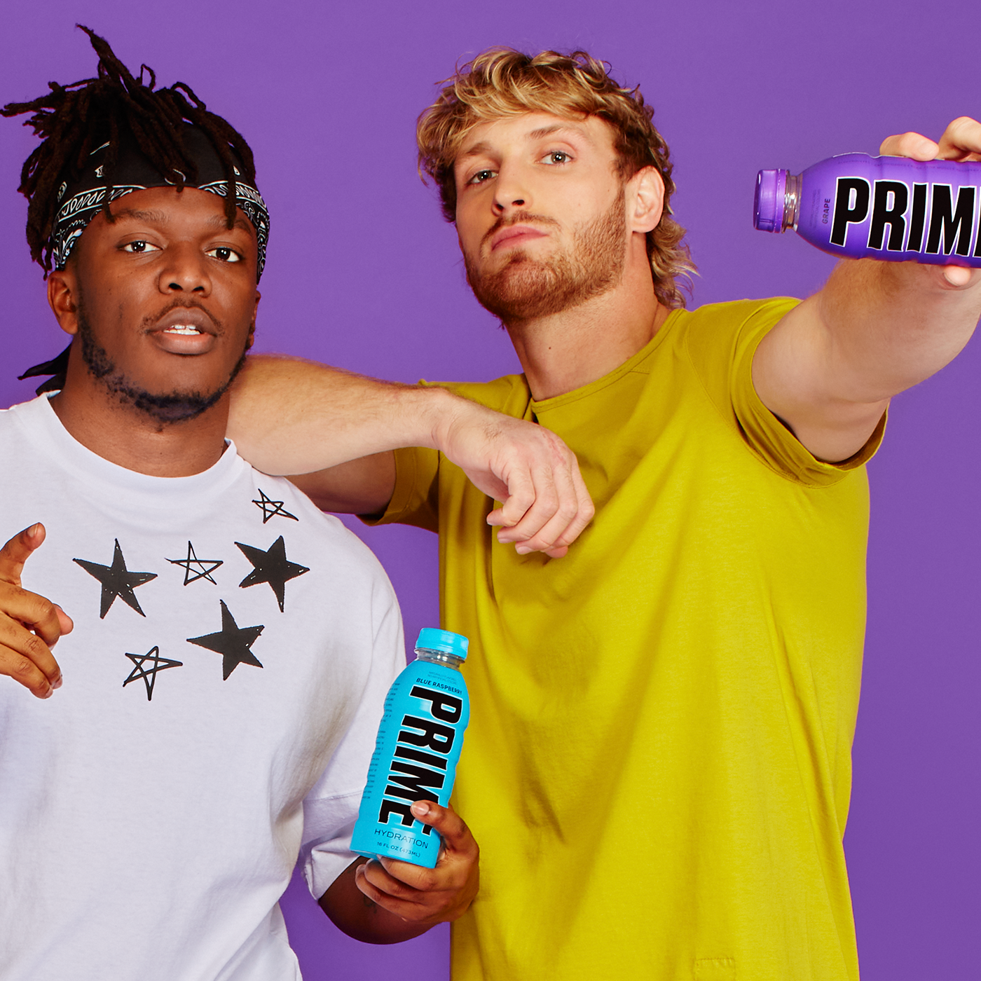 KSI and Logan Paul each held a bottle of Prime hydration drink, one in Blue Raspberry and the other in Grape flavor.